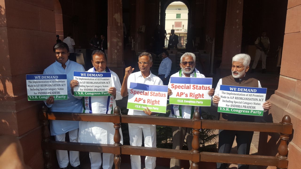YSRCP MPs continuing their protest in the Parliament premises on Wednesday demanding Special Category Status to Andhra Pradesh.