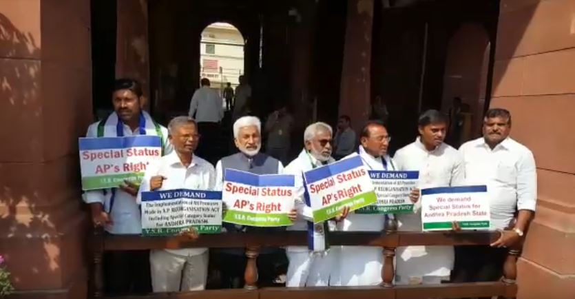 YSRCP MPs continued their protest at the entrance of Parliament House on Monday